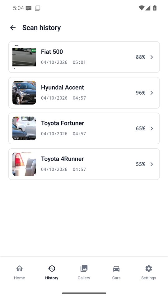 The scan history screen showing four different cars